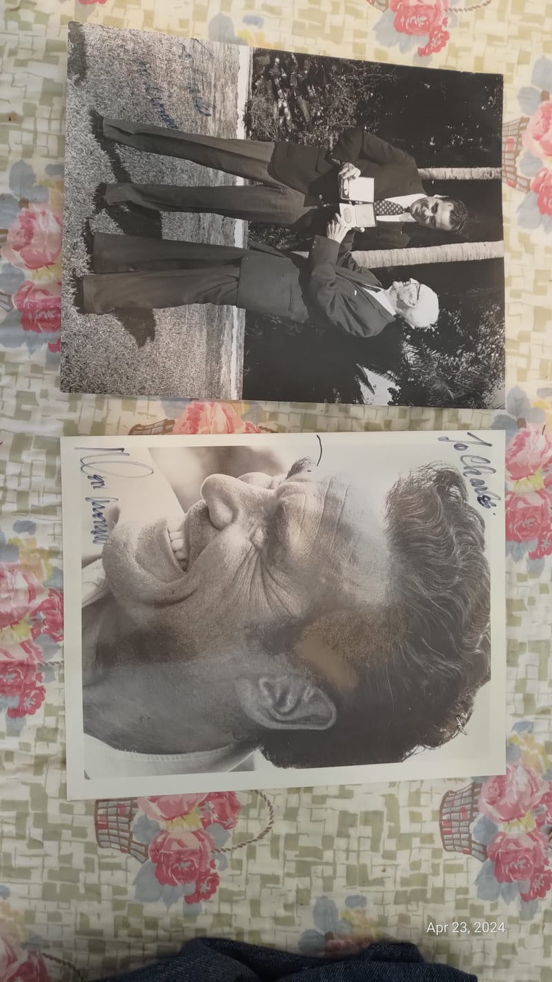 Photograph of two Donald Aronow press photographs