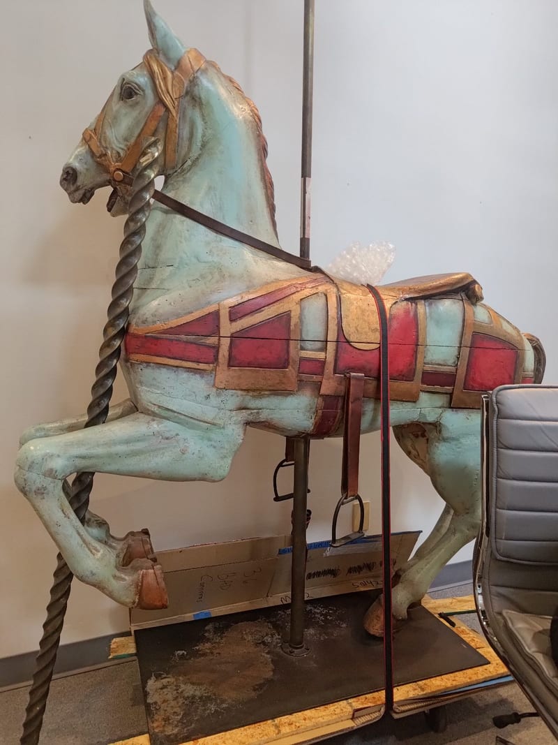 Antique painted wooden carousel horse with pole